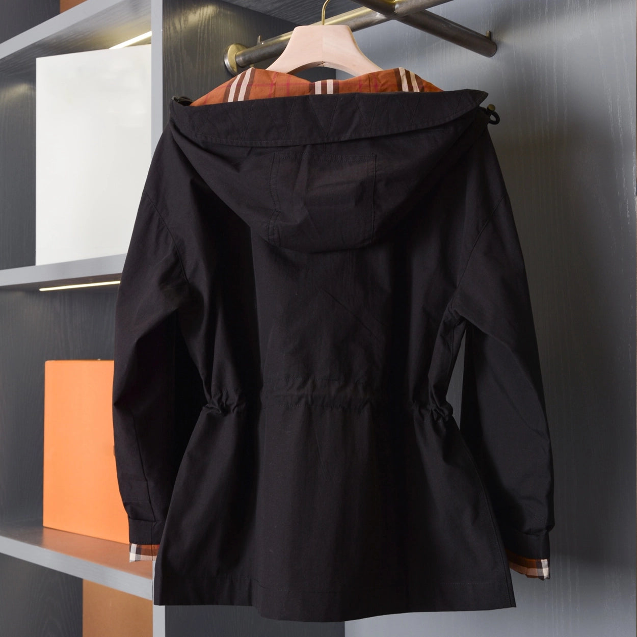 Hooded zip-up jacket, waist-cinched mid-length trench coat