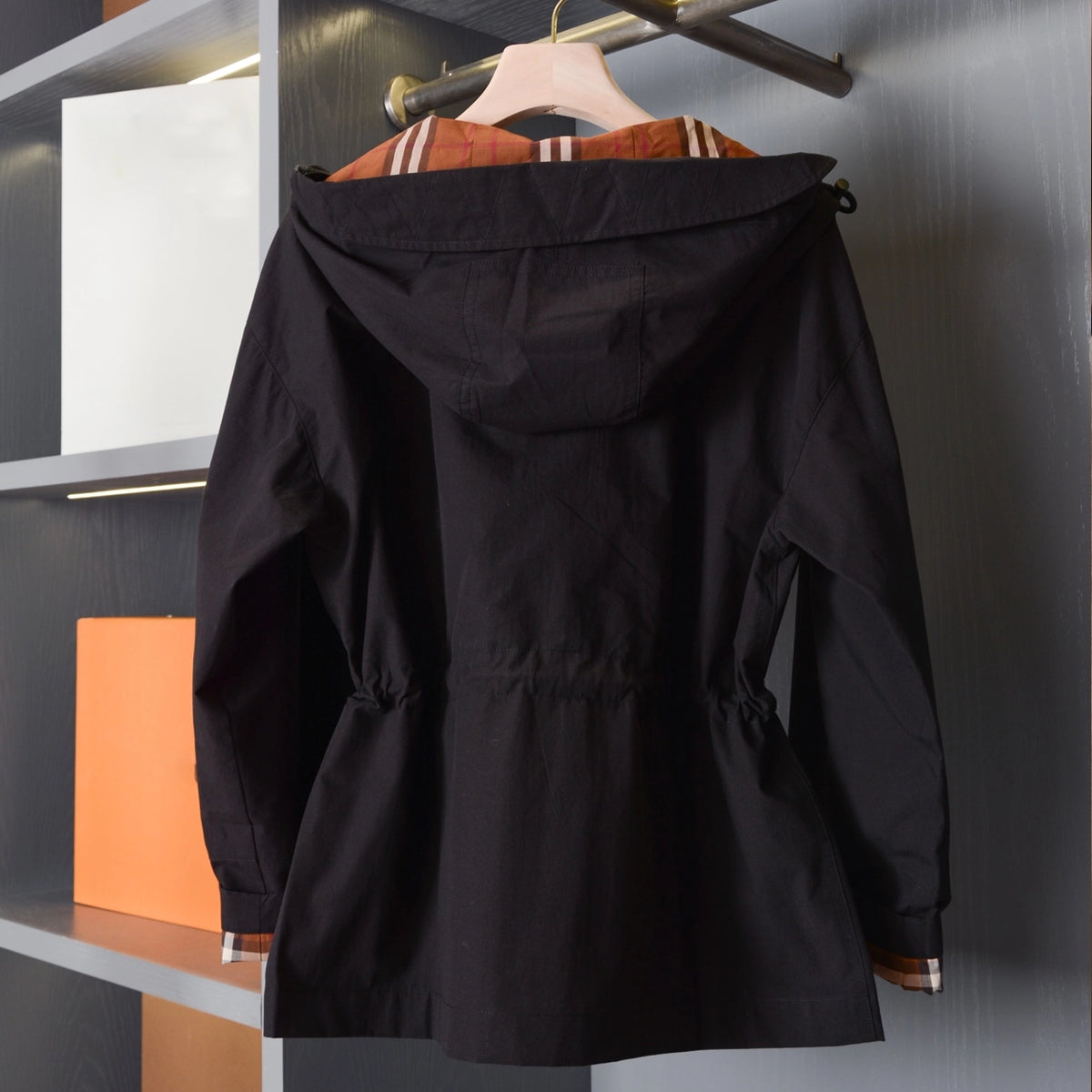 Hooded zip-up jacket, waist-cinched mid-length trench coat