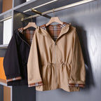Hooded zip-up jacket, waist-cinched mid-length trench coat